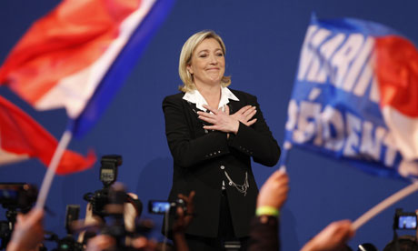 Marine Le Pen celebrates at a Front National rally after the presidential election first round